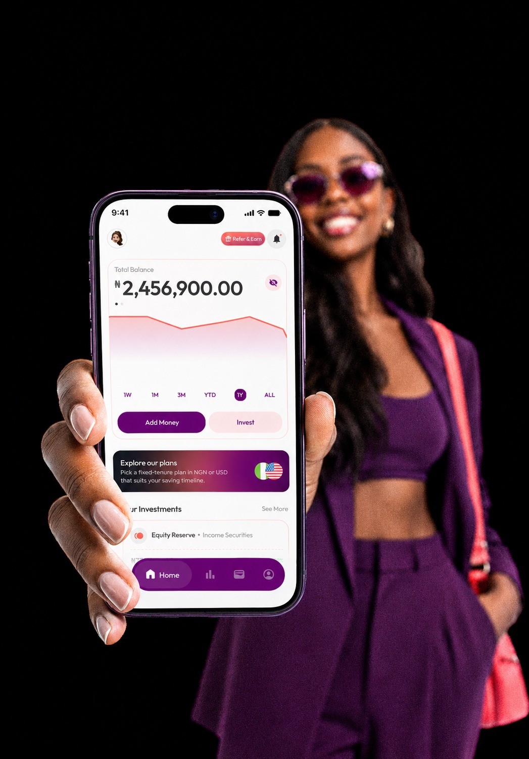 Smiling woman holding out the Kivo app home screen